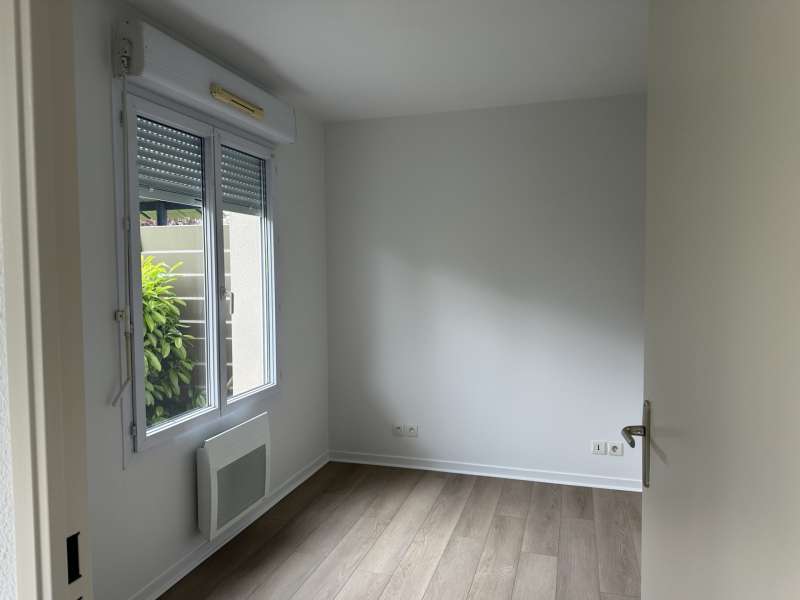 Appartement T2 bis meublé avec jardin et parking 